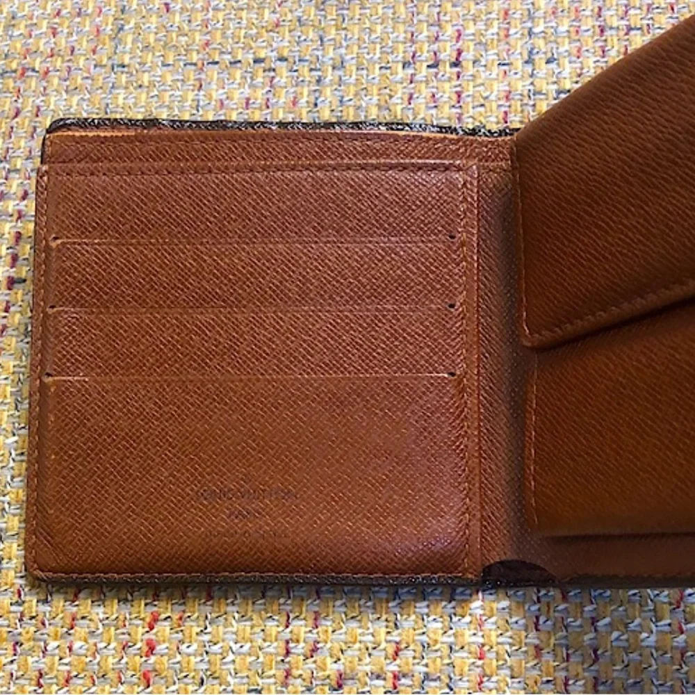 LOUIS VUITTON LV Monogramed Bifold Wallet CA0092 COMES WITH: LV Dust Bag